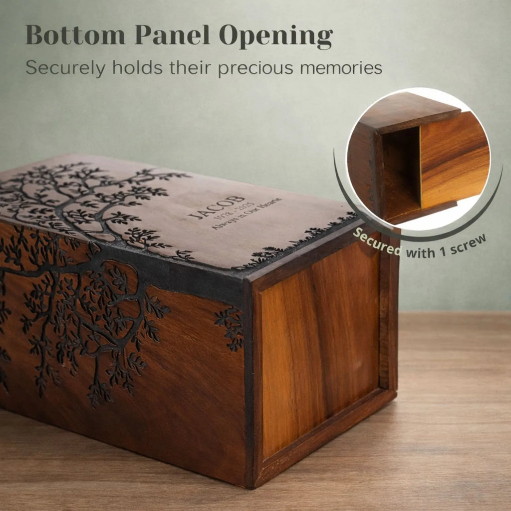 Wooden box with tree design and 'bottom panel opening' text on a wooden surface.