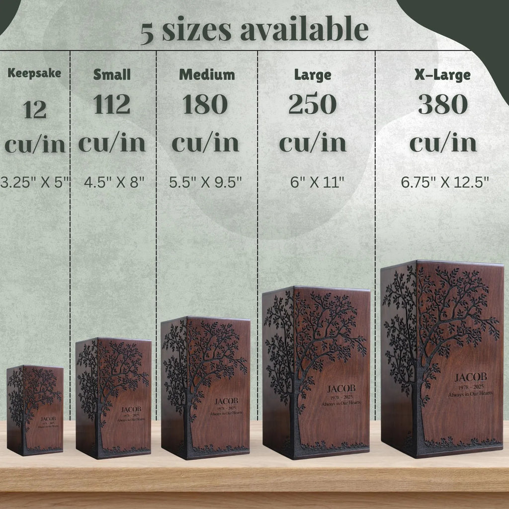 Wooden keepsake boxes of different sizes with tree design and 'JACOB' engraving, displayed against a neutral background.